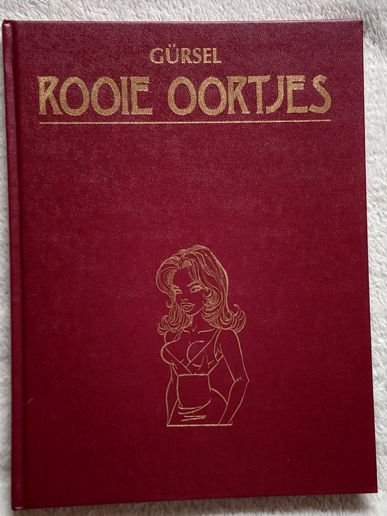 rooie oortjes hardcover, Gürsel Tino Eva e.a. , volgnr 9, Boeken, Stripboeken, Eén stripboek, Ophalen of Verzenden, Zo goed als nieuw