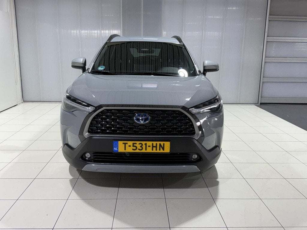 Toyota Corolla Cross Hybrid 140 Dynamic | Dealer onderhouden, Auto's, Toyota, Stof, Gebruikt, 4 cilinders, Origineel Nederlands