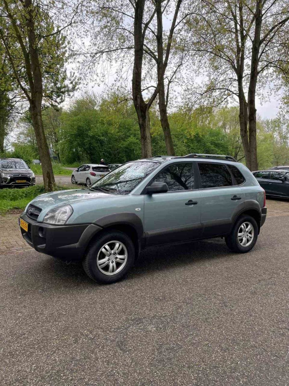 Hyundai Tucson 2.0 I 2WD 2007 Grijs, Auto's, 4 cilinders, Alcantara, Origineel Nederlands, 75 €/maand