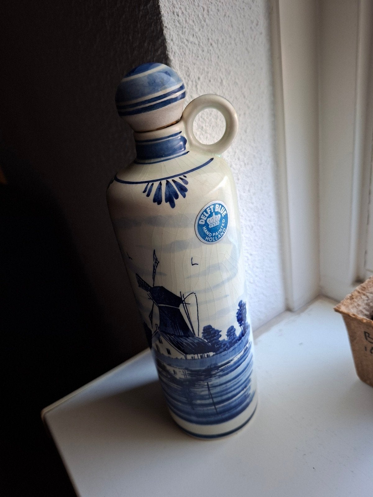 handbeschilderde Delfts blauwe jeneverfles, Ophalen