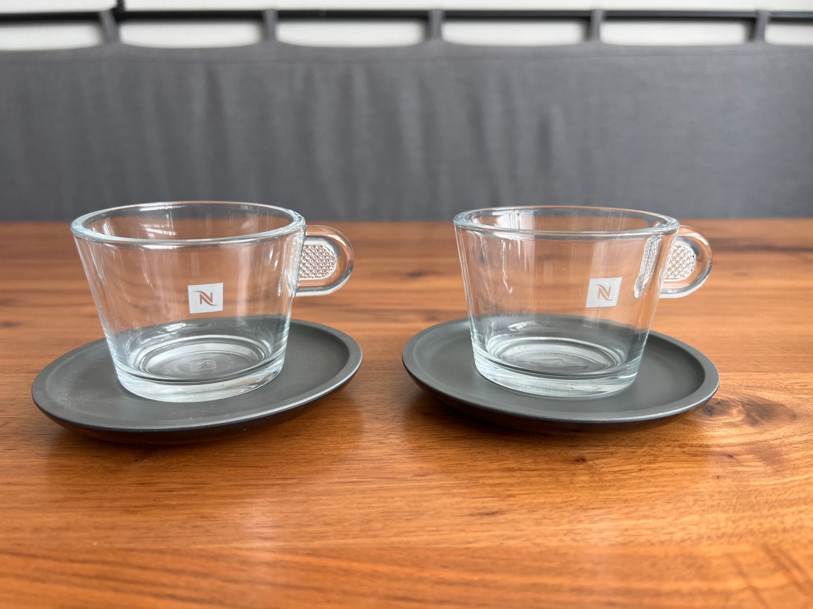 Nespresso kop en schotel - 2 stuks, Ophalen, Gebruikt, Glas, Overige stijlen