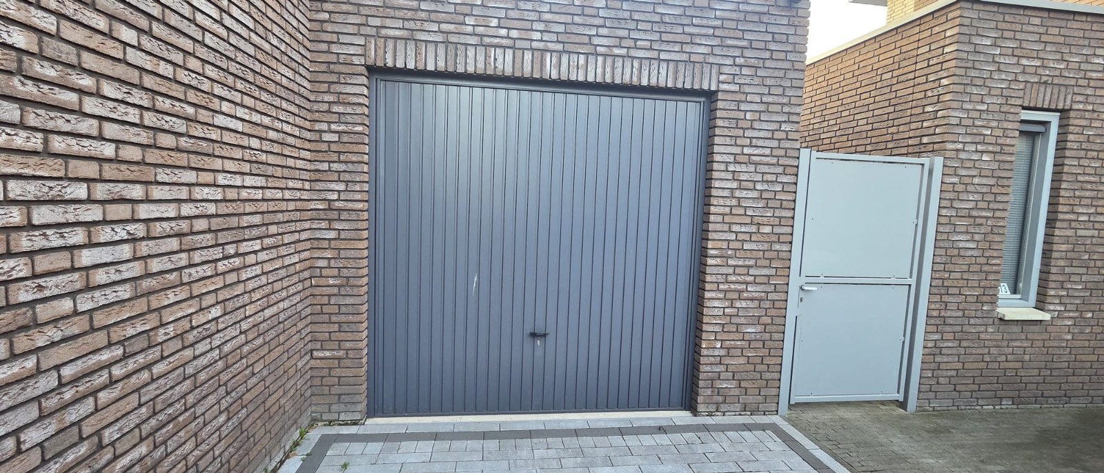 kantel garagedeur, Ophalen, Zo goed als nieuw