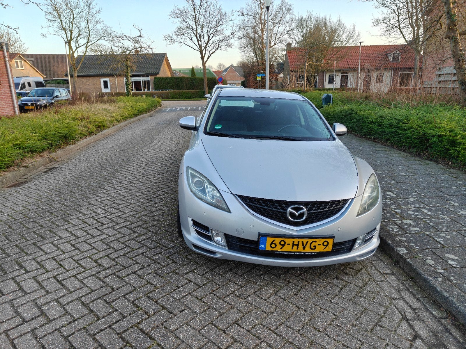 Mazda 6 2.0 Sport Hatchback AUT 2009 Grijs, Auto's, Mazda, 1330 kg, Stof, Zwart, 4 cilinders