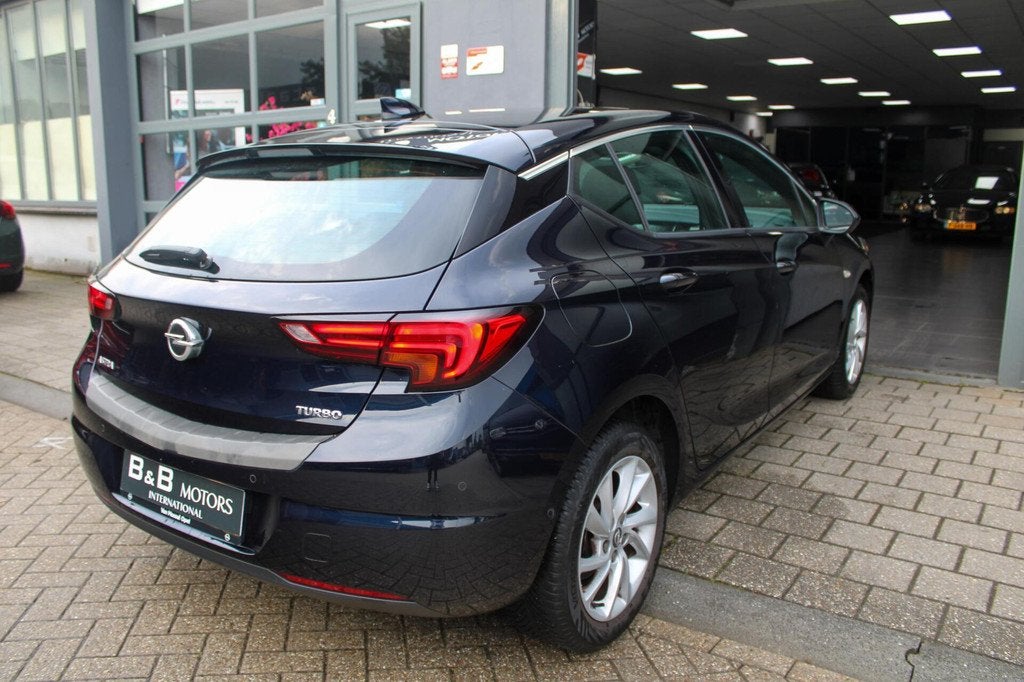 Opel Astra 1.4 Turbo|CAM|CRUISE|NAVI|DODE HOEK_|DEALER OH+, 125 pk, Gebruikt, 4 cilinders, Met garantie (alle)