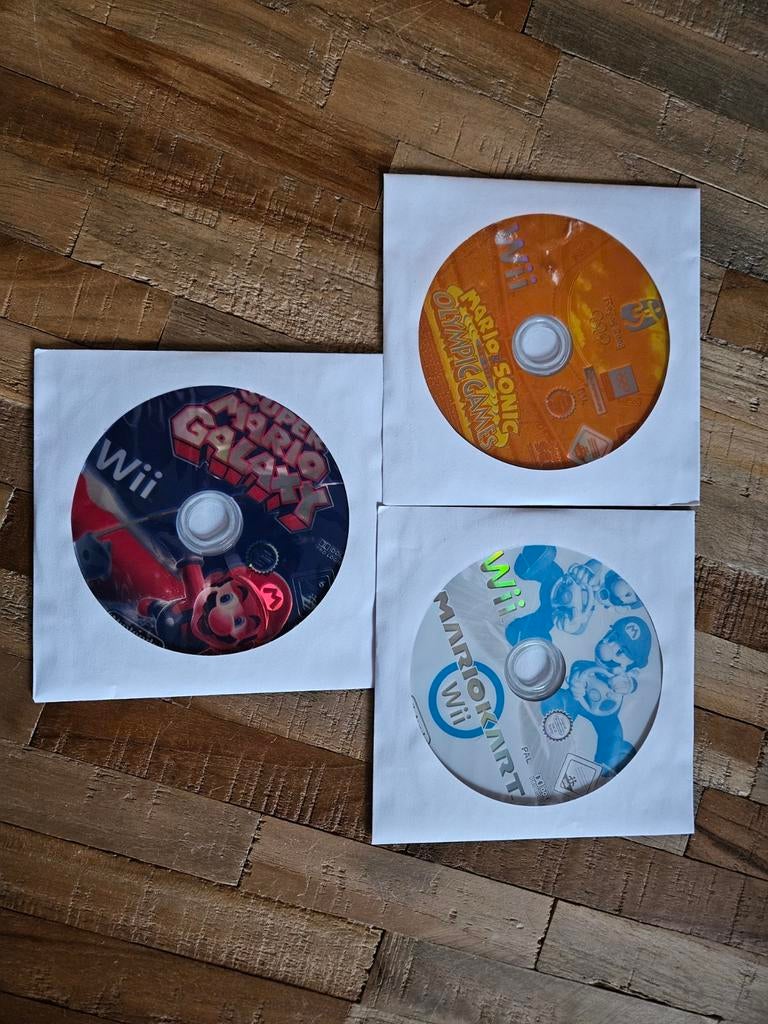 Wii Mario games: Mario Kart, Super Mario Galaxy, Ophalen, Racen en Vliegen, Zo goed als nieuw, 3 spelers of meer
