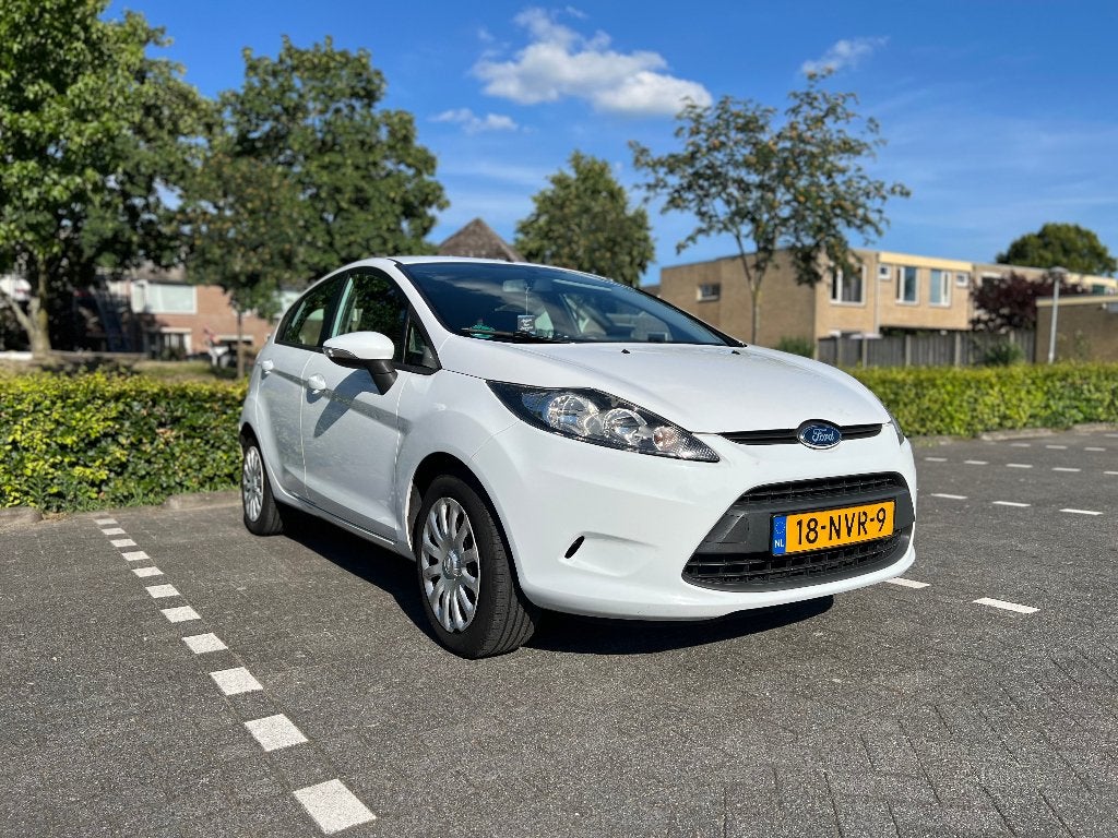 Ford Fiësta Limited 1.25 44KW 5DR 2010 Wit, Auto's, Ford, Particulier, Fiësta, ABS, Airbags, Airconditioning, Boordcomputer, Centrale vergrendeling
