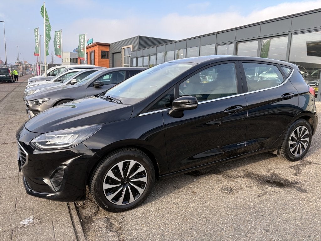Ford Fiesta 1.0 EcoBoost Hybrid Titanium (bj 2023), Auto's, Voorwielaandrijving, Dealer onderhouden, Stof, Gebruikt
