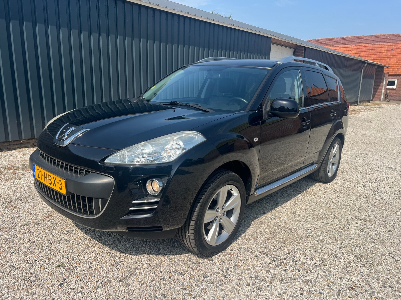 Peugeot 4007 2.4 16V 4WD 7P CVT 2008 Zwart NWE APK, Auto's, Peugeot, Automaat, Zwart, 4 cilinders, Traction-control