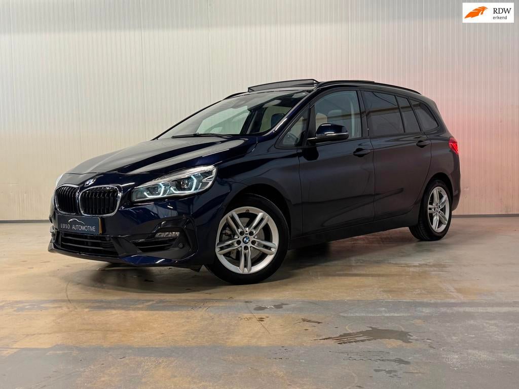 BMW 2-serie Gran Tourer 218i High Executive | PANO | TREKHAA, Gebruikt, Euro 6, 2-Serie Gran Tourer, Blauw