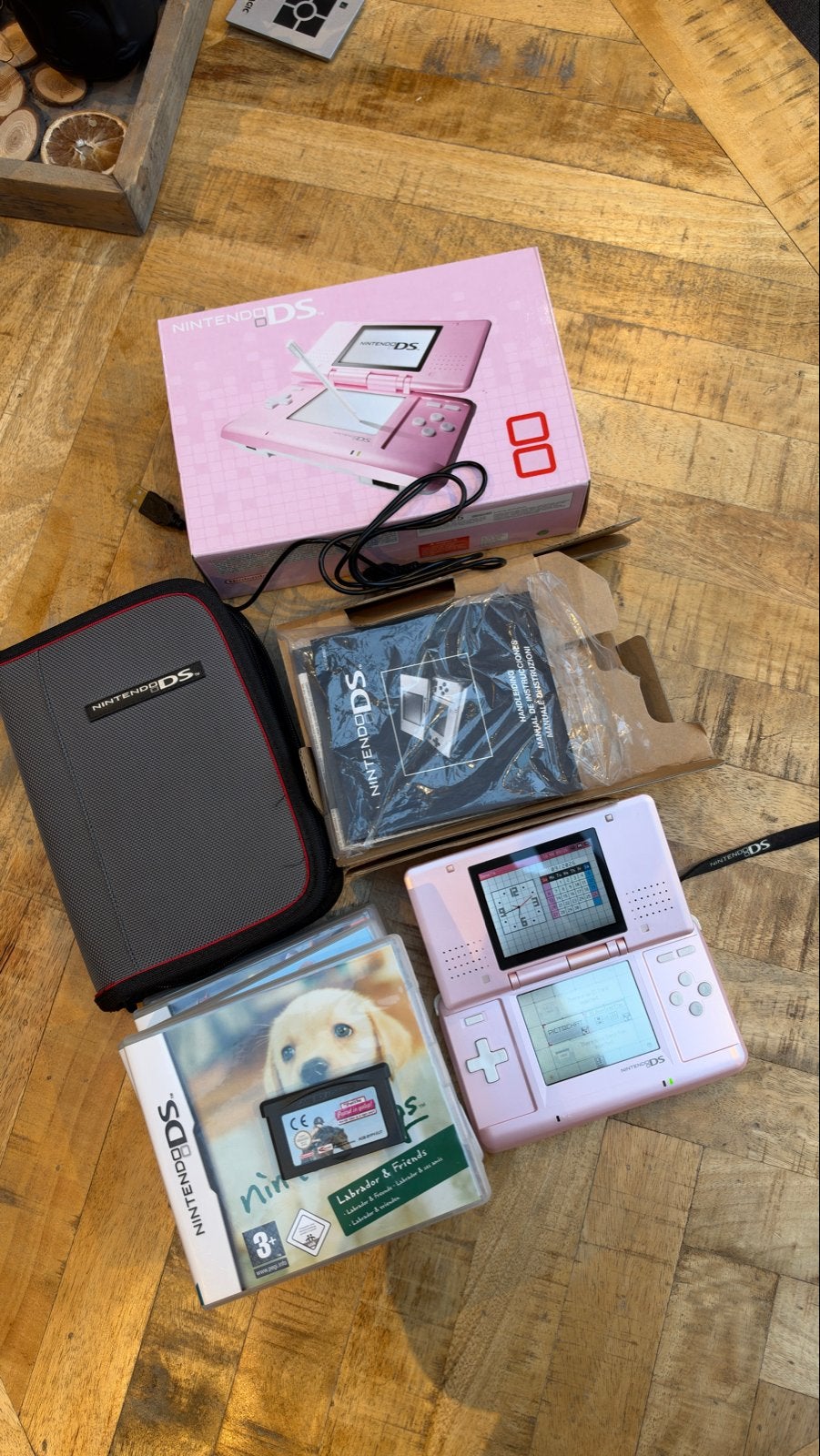 Nintendo DS Lite met 5 games en beschermhoes COMPLEET, Spelcomputers en Games, Met games, Verzenden, DS Original of Phat, Zo goed als nieuw