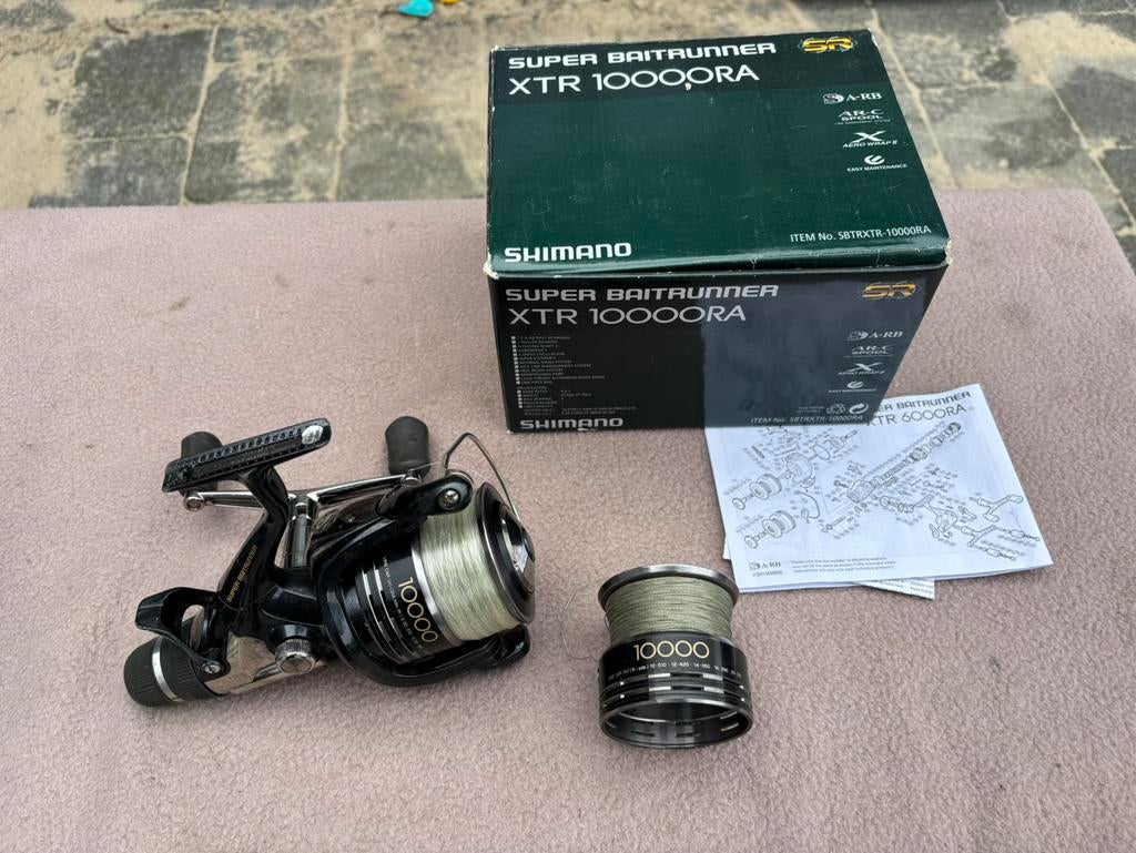 Shimano super baitrunner xtr 10000 ra incl spoel, Ophalen of Verzenden, Zo goed als nieuw, Molen
