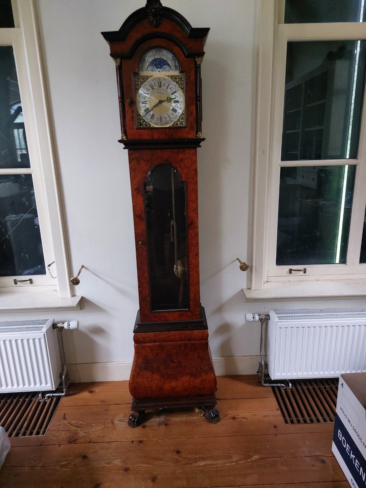 MAHONIE  STAANDE WANDKLOK, Ophalen