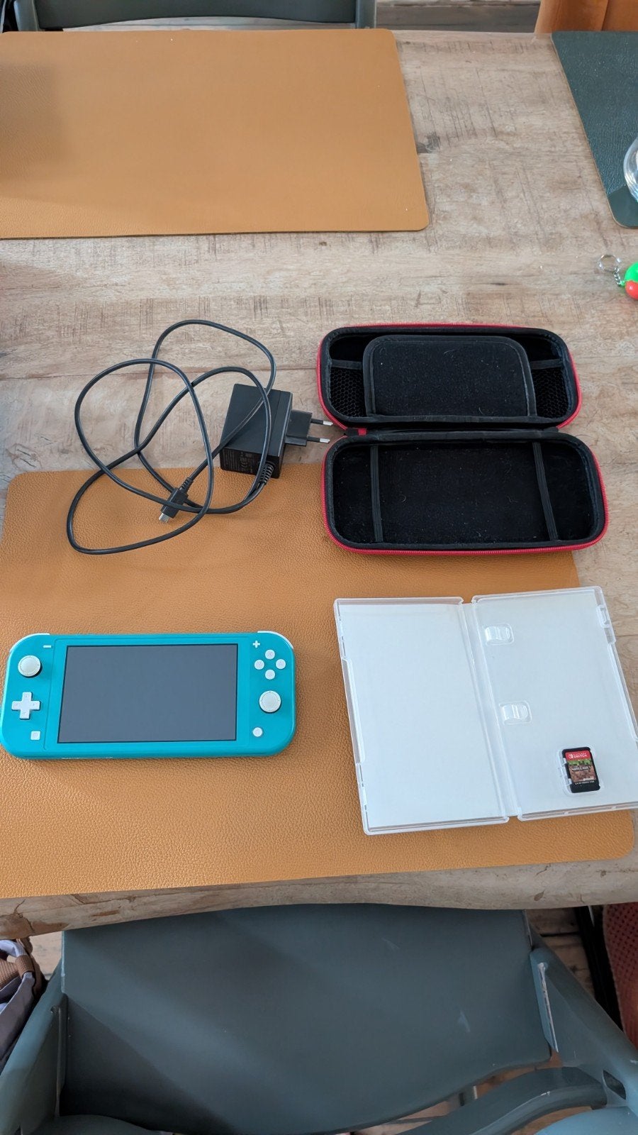 Nintendo Switch Lite Turquoise met game en hoesje, Met games, Ophalen of Verzenden, Zo goed als nieuw, Zonder controller