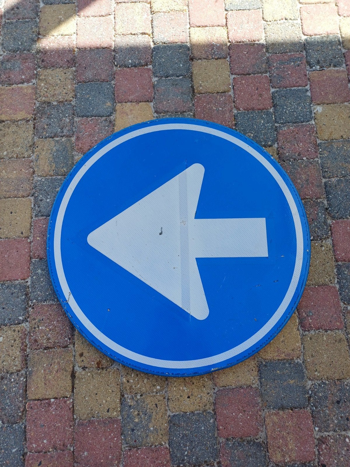 1 richting verkeersbord, Ophalen
