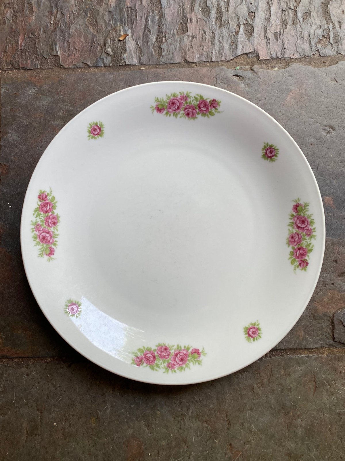 Bord met bloemen rand, Ophalen