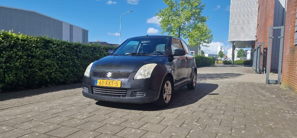 Suzuki Swift 1.3 3D 2006 Zwart, Auto's, Suzuki, 31 €/maand, Handgeschakeld, 1000 kg, Geïmporteerd