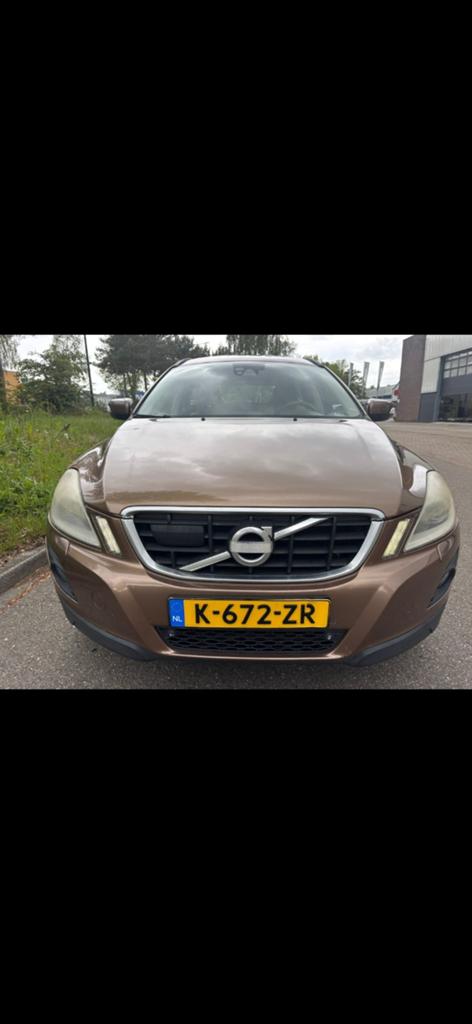 Volvo XC60 2.4 D5 AWD Geartronic 2009 Bruin, 1716 kg, Zwart, 197 €/maand, Navigatiesysteem