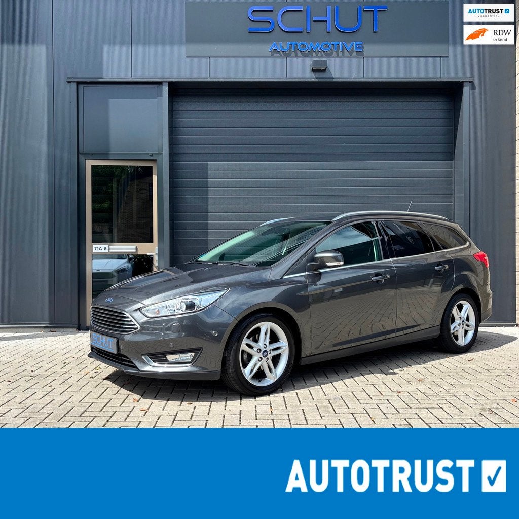 Ford Focus Wagon 125pk Titanium XENON | CLIMA | SONY SOUNDYS, Auto's, Zwart, Bi-Xenon koplampen, Origineel Nederlands, Handgeschakeld