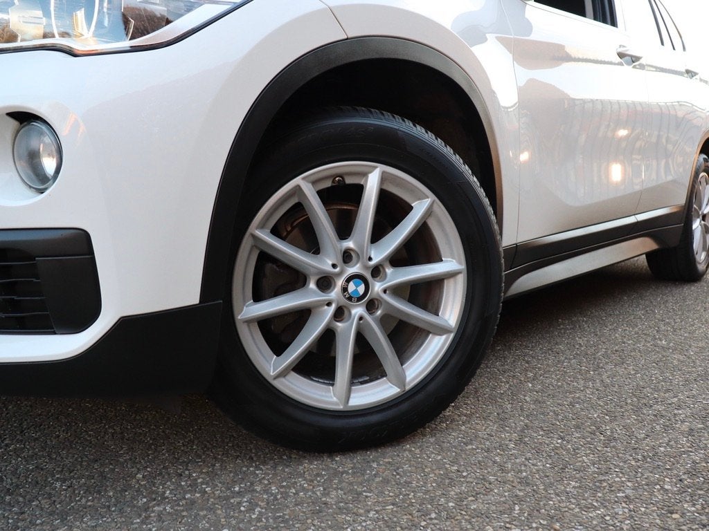 BMW X1 sDrive16d Centennial Executive A tot Z onderhouden, Auto's, Stof, Gebruikt, 116 pk, Wit