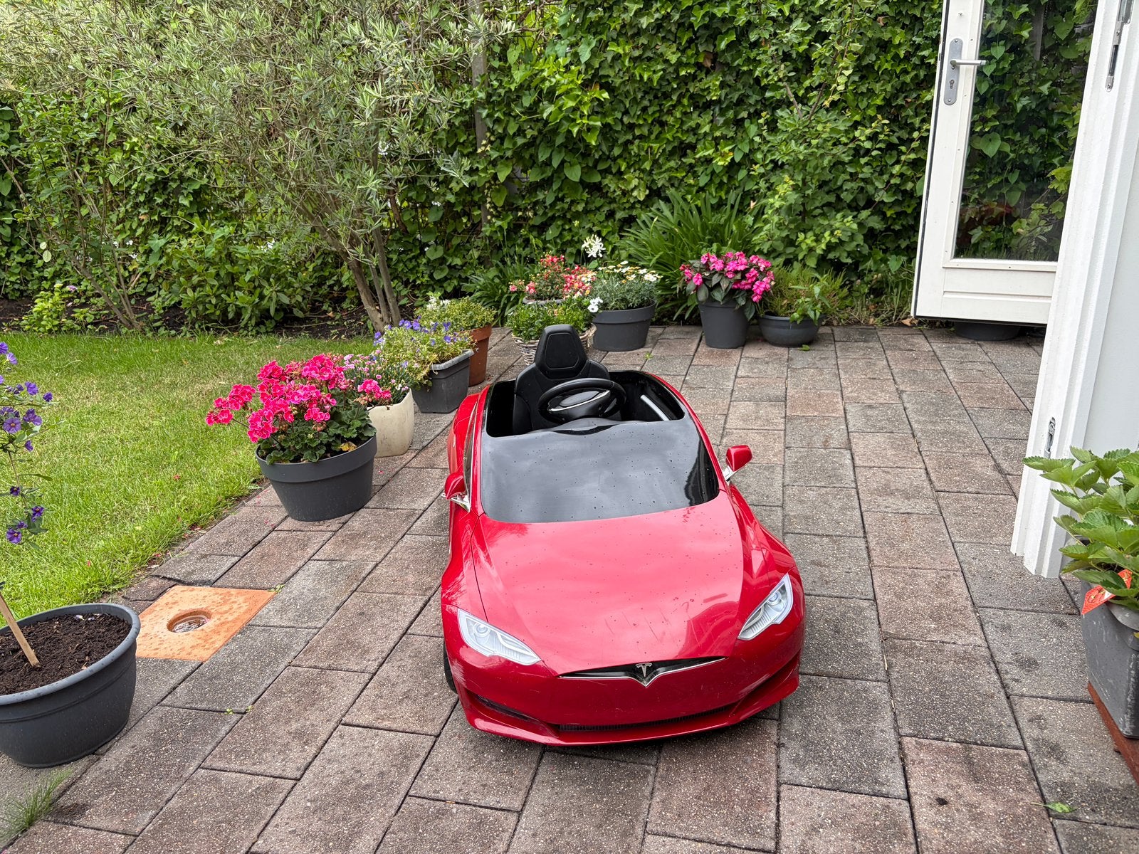 Electrische kinderauto Tesla, Kinderen en Baby's, Speelgoed | Buiten | Voertuigen en Loopfietsen, Ophalen, Gebruikt, Overige typen