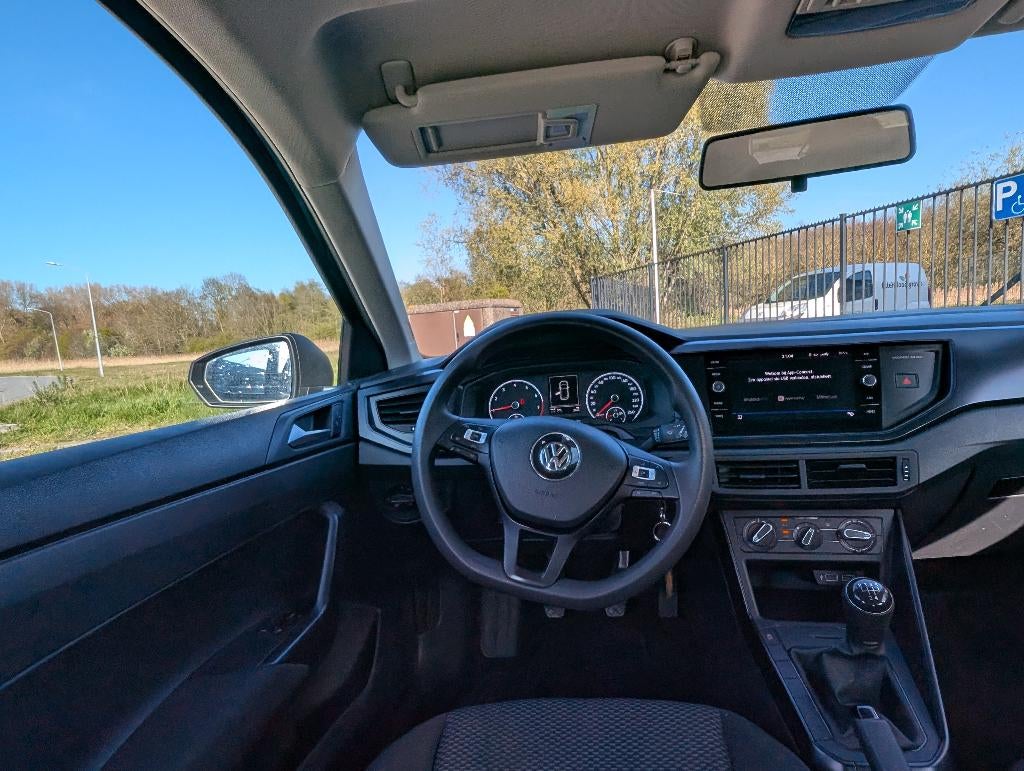 Volkswagen Polo 1.0 NAVI | CAMERA | DEALER OND. | URANO GRAU, 1005 kg, Stof, 74 pk, Bedrijf