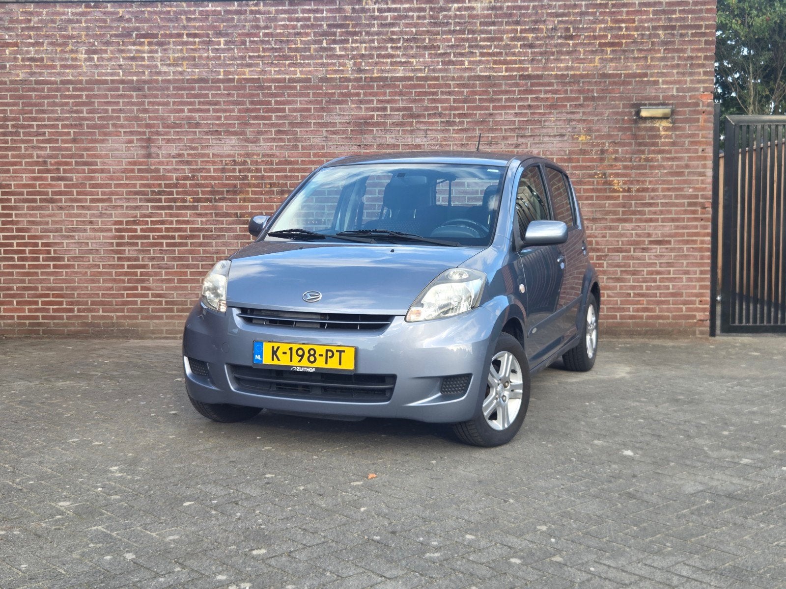 Daihatsu Sirion 1.3 2009 Grijs Nieuwe APK Carplay, Auto's, Voorwielaandrijving, Stof, 4 cilinders, Sirion