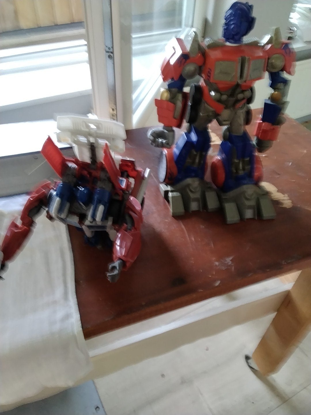 Transformers actiefiguren - Optimus Prime en Devastator, Verzamelen, Transformers, Ophalen of Verzenden