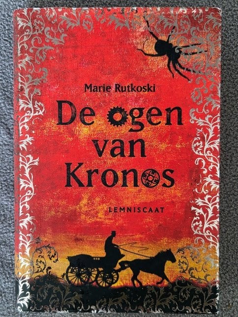 De ogen van Kronos - Marie Rutkoski, Gelezen, Ophalen of Verzenden, Fictie, M. Rutkoski