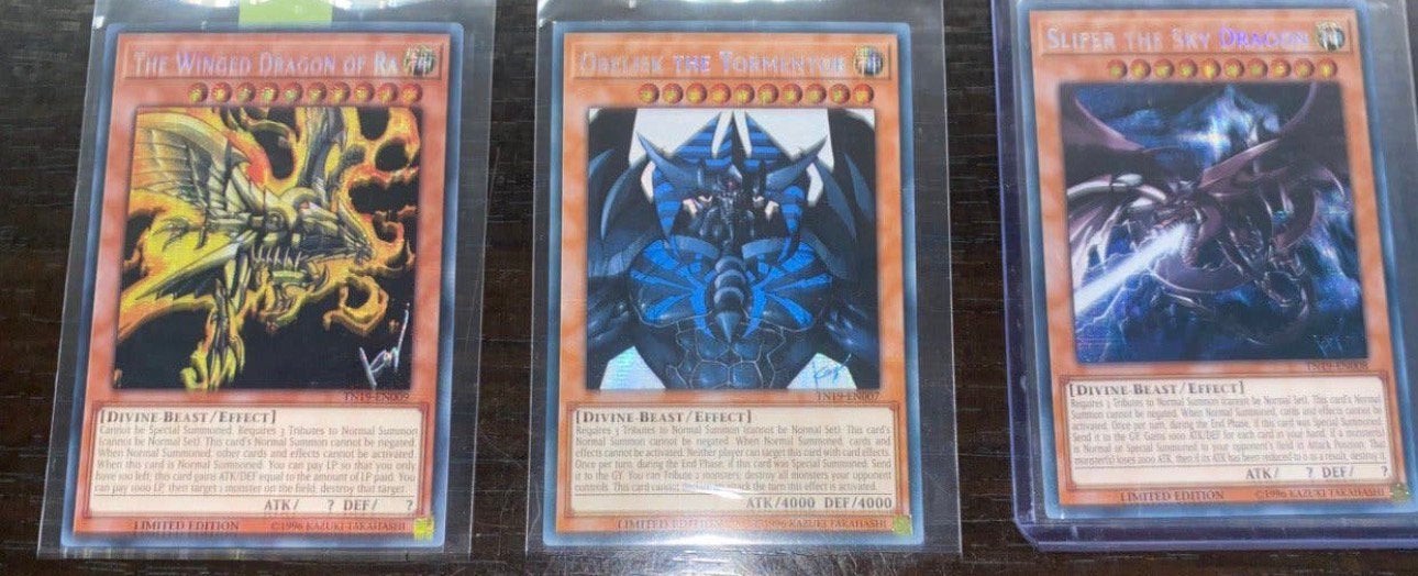 Yu-Gi-Oh! Egyptian God Card Set TN19 Promo !, Ophalen of Verzenden, Zo goed als nieuw, Meerdere kaarten, Foil