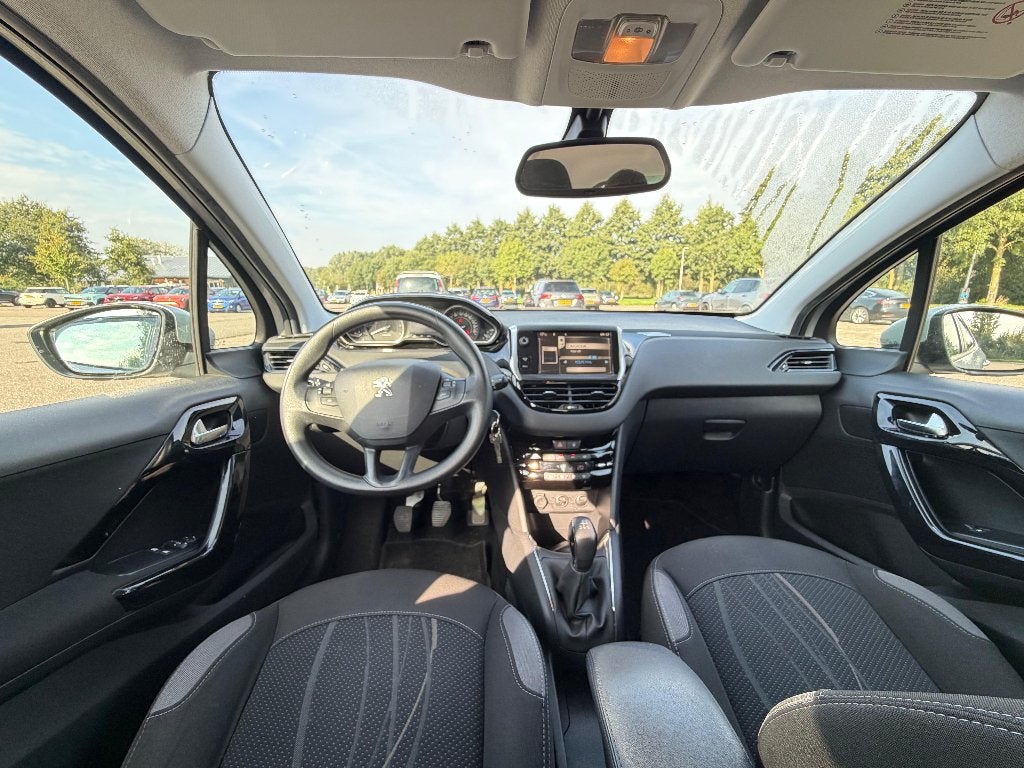 Foto 14 van Peugeot 208 1.2 VTi 82PK 5D 2013 - Grijs / Zilver