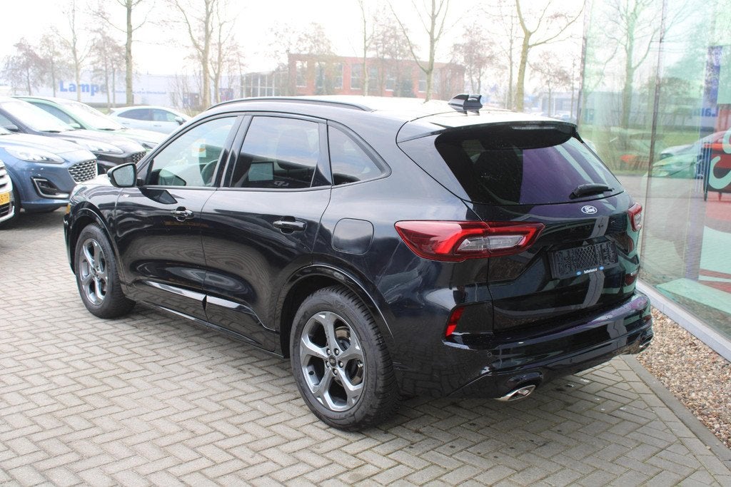 Ford Kuga 2.5 FHEV ST-Line 190pk | Winterpack | Achteruitrij, Auto's, Ford, Stof, Gebruikt, 1589 kg, Zwart