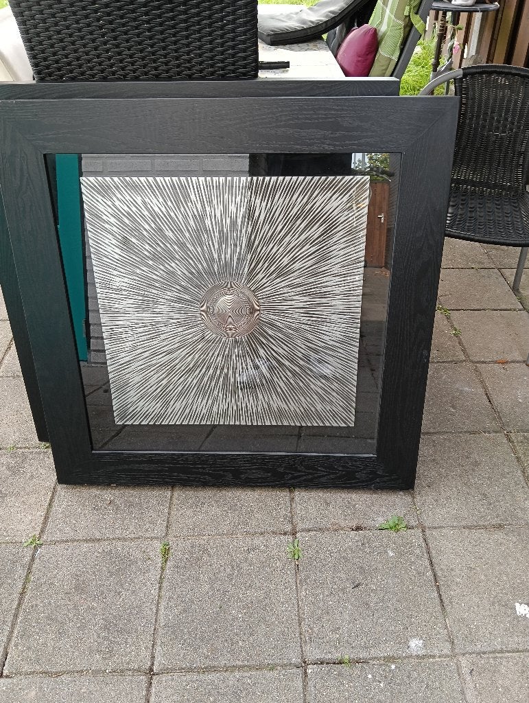 Moderne wanddecoratie met zonnestraal design, Ophalen