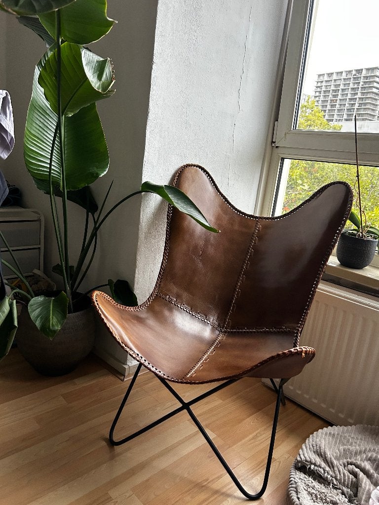 Vlinderstoel, Ophalen, Bruin, Leer, Zo goed als nieuw