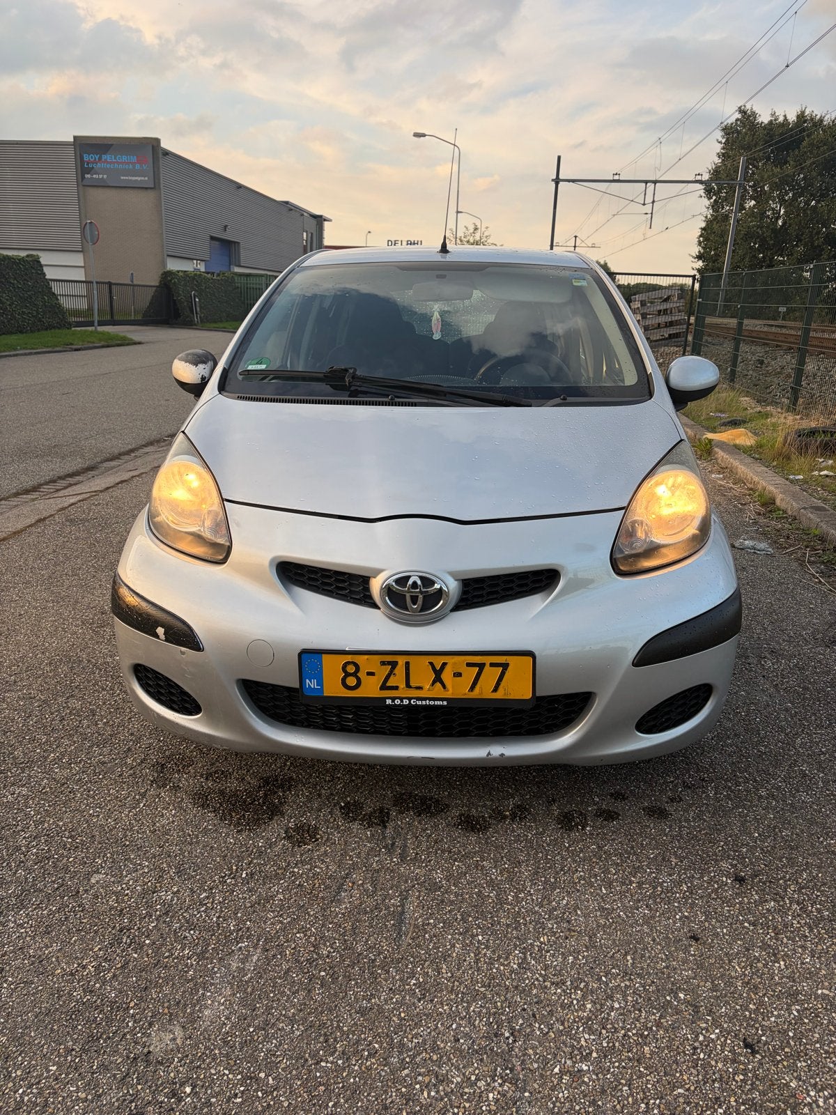 Toyota Aygo 1.0 12V Vvt-i 5DRS 2009 Grijs, Voorwielaandrijving, Stof, Zwart, 4 stoelen