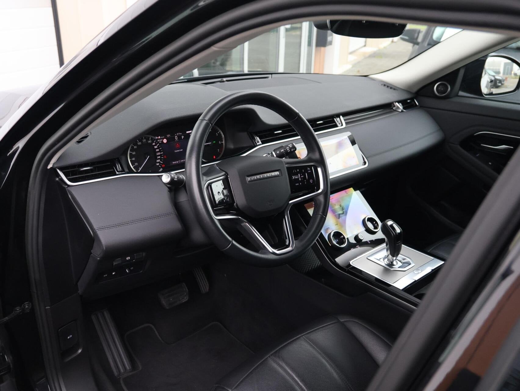 Land Rover Range Rover Evoque 1.5 P300e AWD SE | SOH 91,2%, Auto's, Automaat, Met garantie (alle), Zwart, Bedrijf