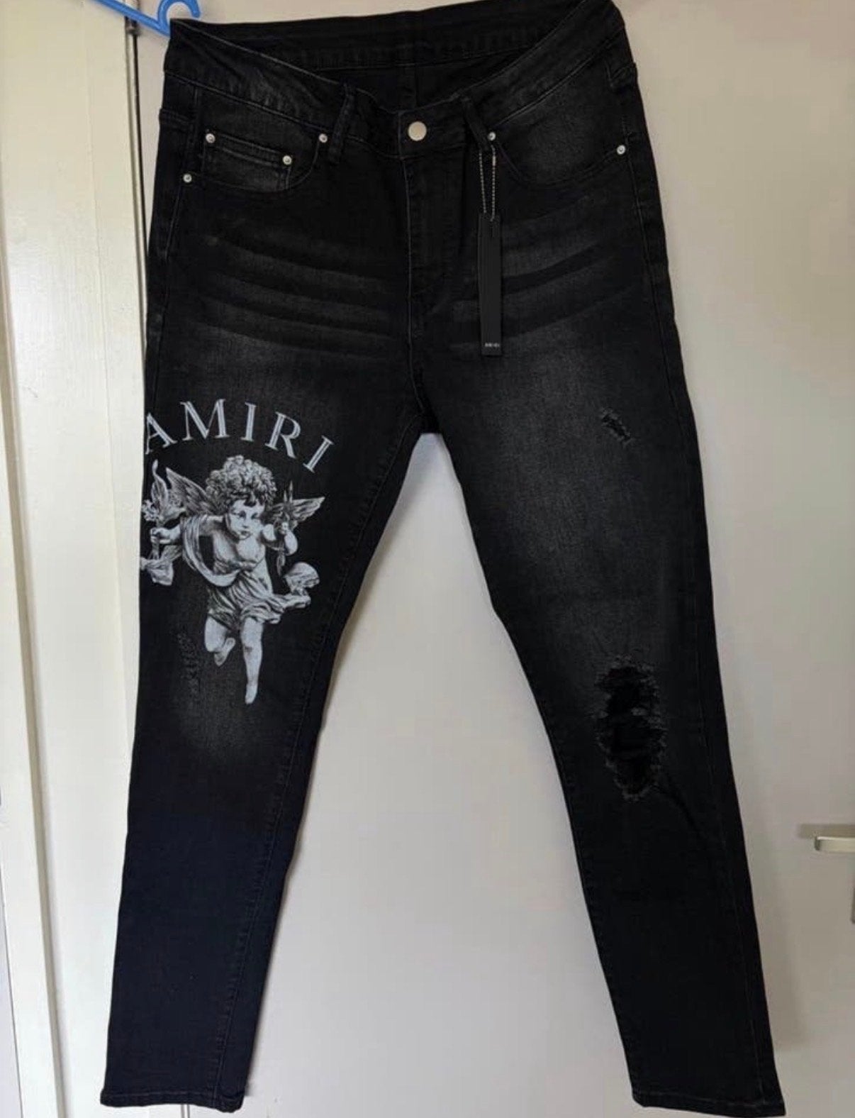 Amiri Jeans met Engelprint - Zwart W33, Kleding | Heren, Spijkerbroeken en Jeans, Ophalen of Verzenden, Nieuw, Zwart, W33 - W34 (confectie 48/50)