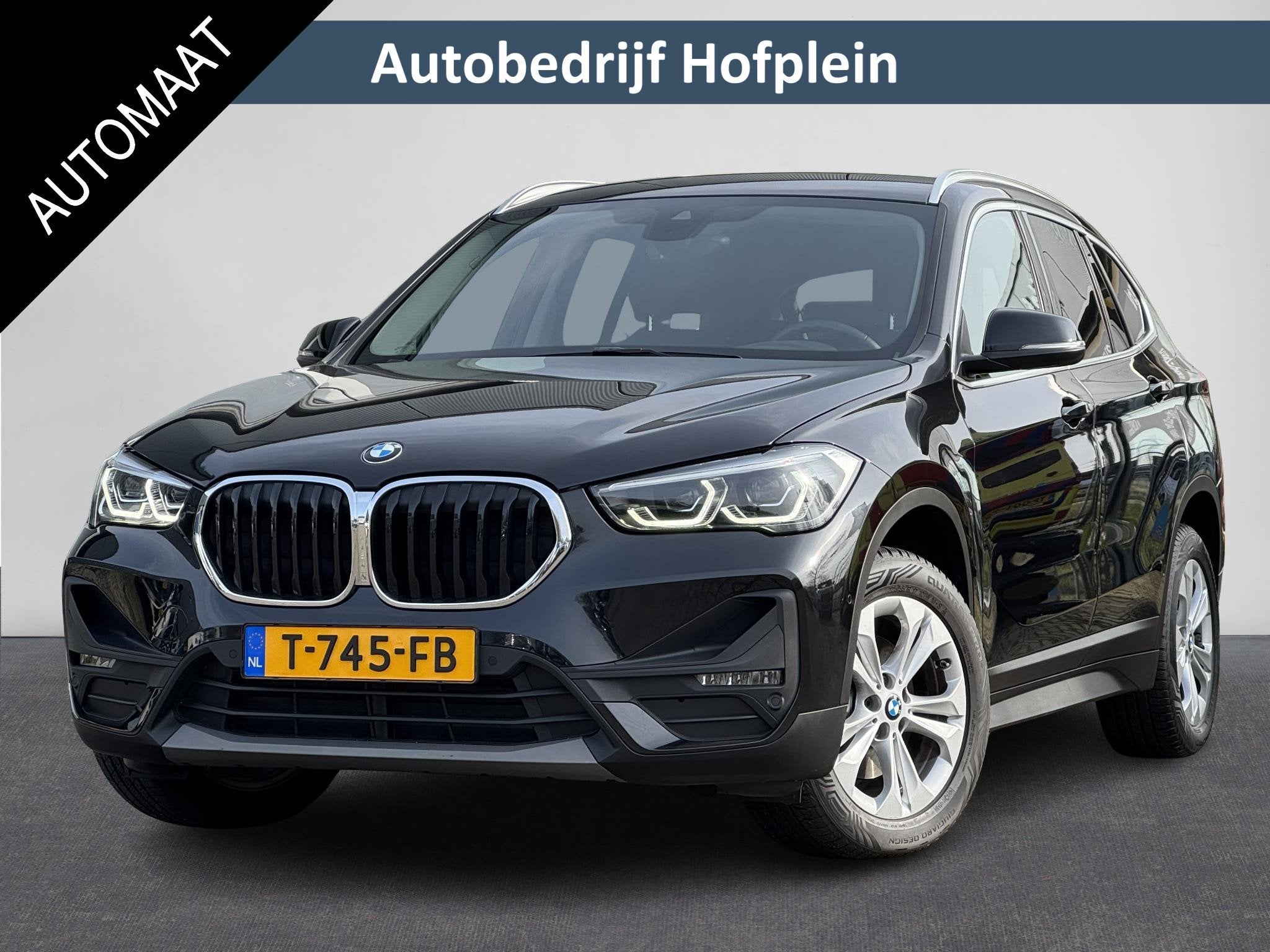 BMW X1 sDrive18iA High Executive | Cruise Control | Camera |, Auto's, Gebruikt, Euro 6, Zwart, 3 cilinders