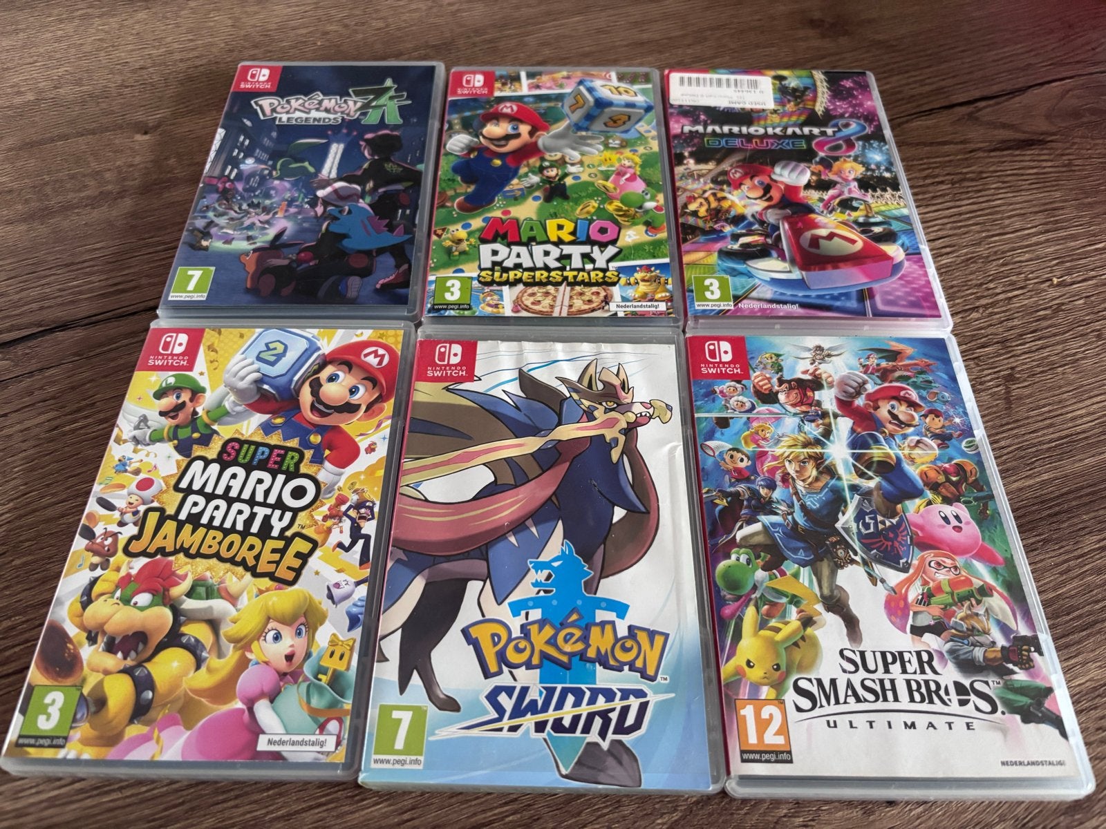 Nintendo Switch met 2 extra controllers en 6 games, Spelcomputers en Games, Ophalen, Met games, Zo goed als nieuw, Switch Original