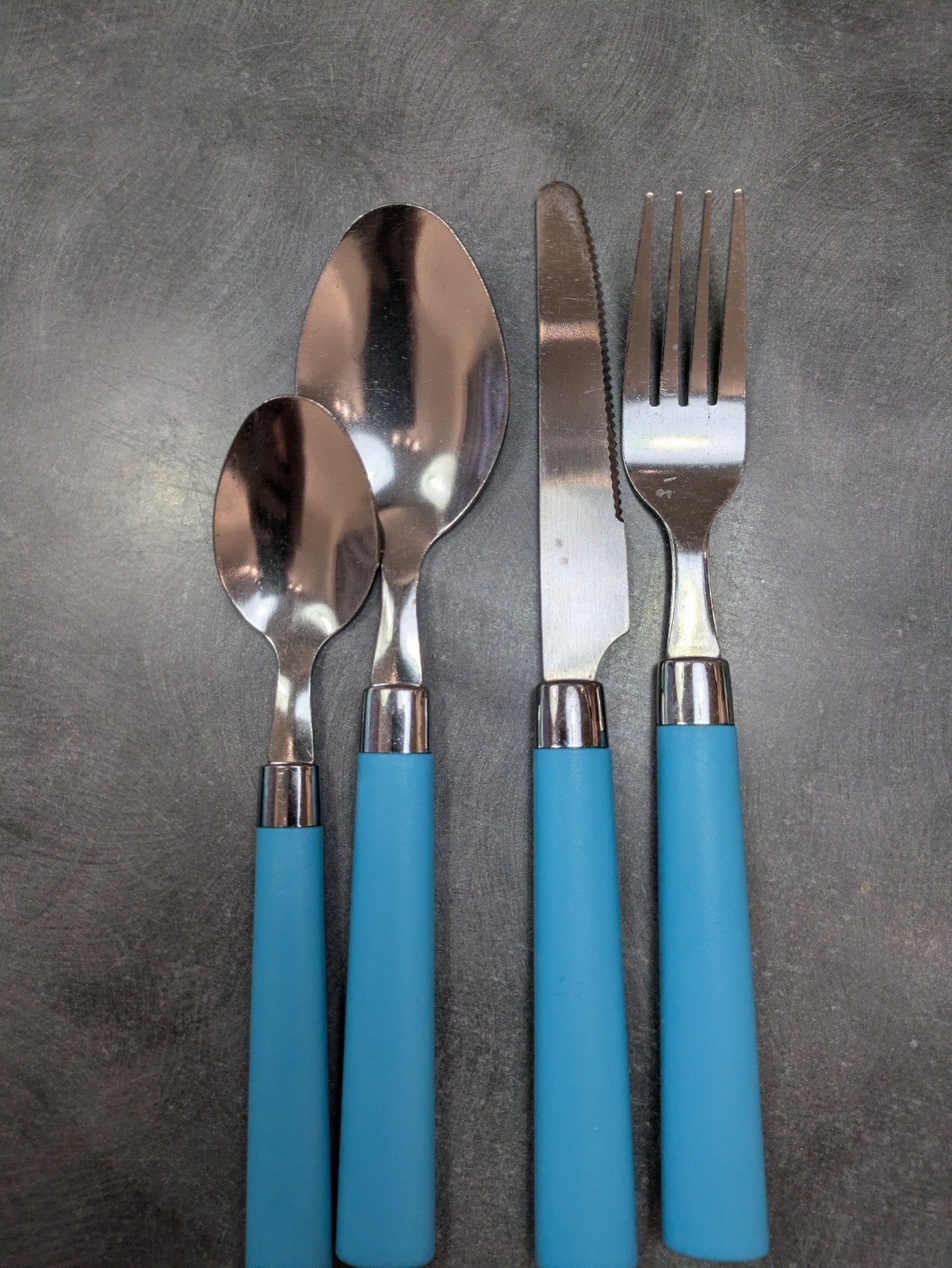 12-delig bestekset met blauwe handvatten, RVS, Antiek en Kunst, Antiek | Bestek, Ophalen of Verzenden