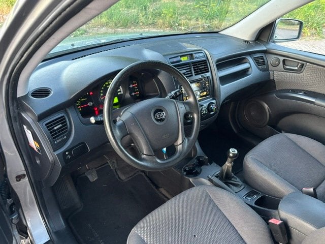 Kia Sportage 2.0 CVVT Comfort Airco Electric pakket Audio/CD, Auto's, Stof, Gebruikt, Zwart, 4 cilinders