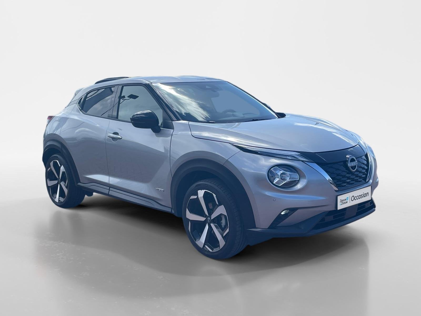 Nissan Juke 1.6 Hybrid Tekna *Navi+Camera*Climate*Parc Assis, Auto's, 1300 kg, Leder en Stof, Origineel Nederlands, Bedrijf