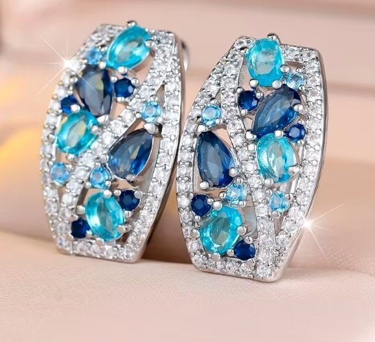 925 sterling zilveren oorbellen met licht blauwe zirkonen, Verzenden, Nieuw, Met edelsteen, Knopjes of Stekers