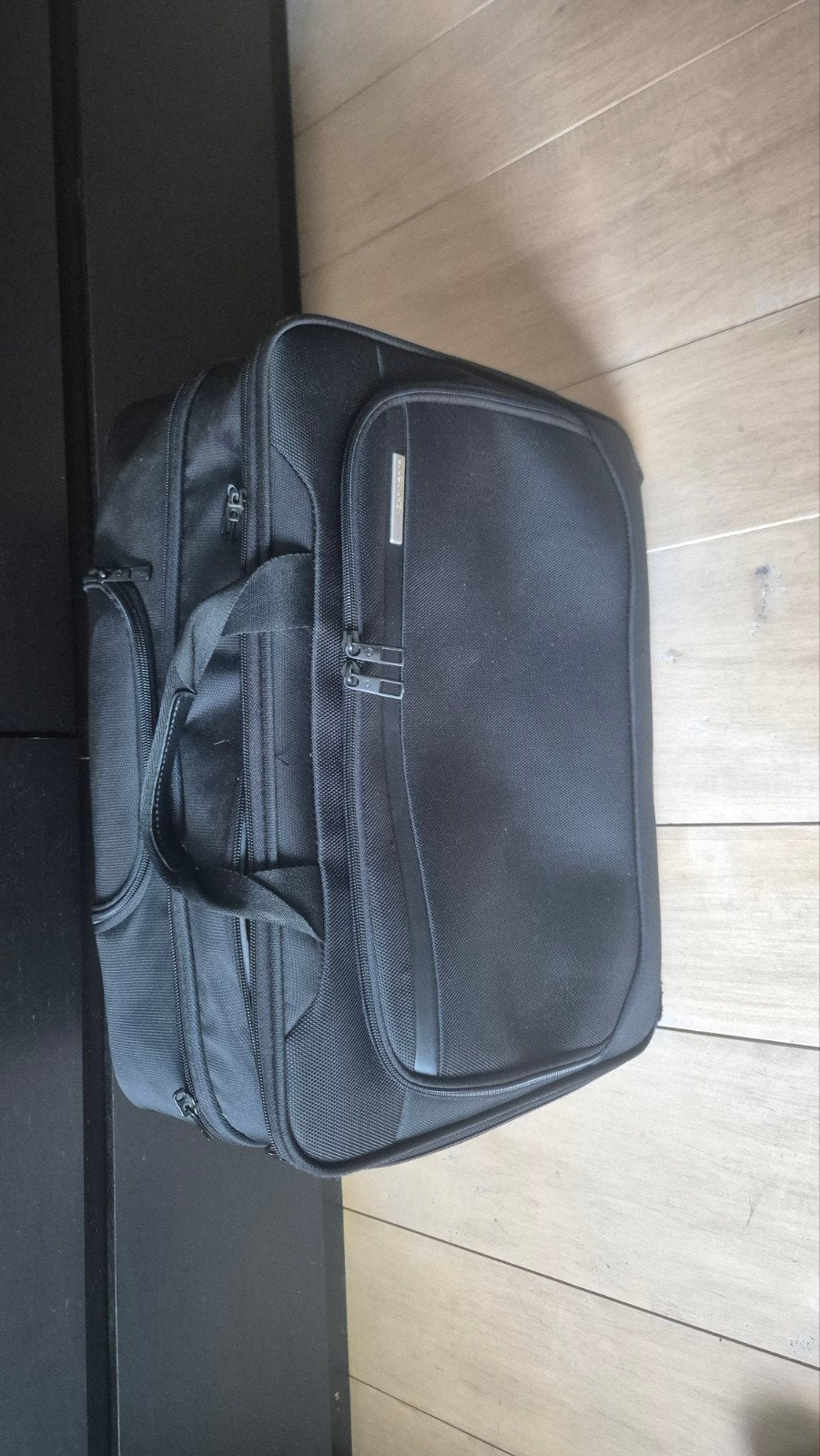 Zwarte reistas met wieltjes en uitschuifbare handgreep, 30 cm of meer, Gebruikt, Zwart, Ophalen of Verzenden