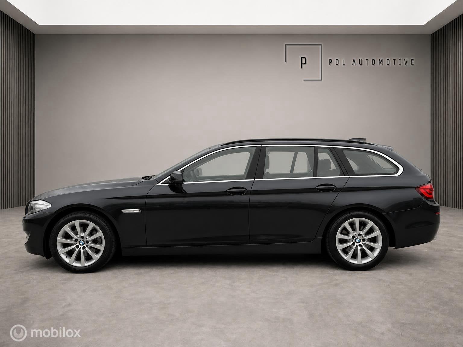 Foto 2 van BMW 5-serie Touring 520i High Executive