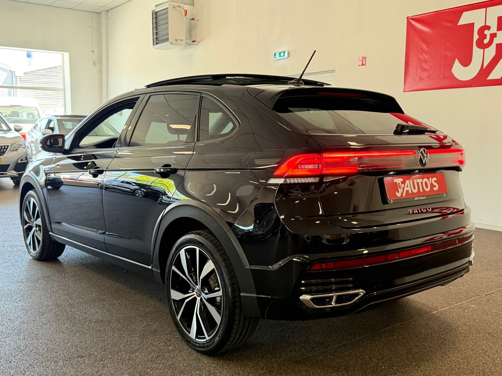 Volkswagen TAIGO 1.0 TSI R-Line|NAVIGATIE|CAMERA|CRUISE|PANO, Automatische klimaatregeling, Stof, Gebruikt, Met garantie (alle)