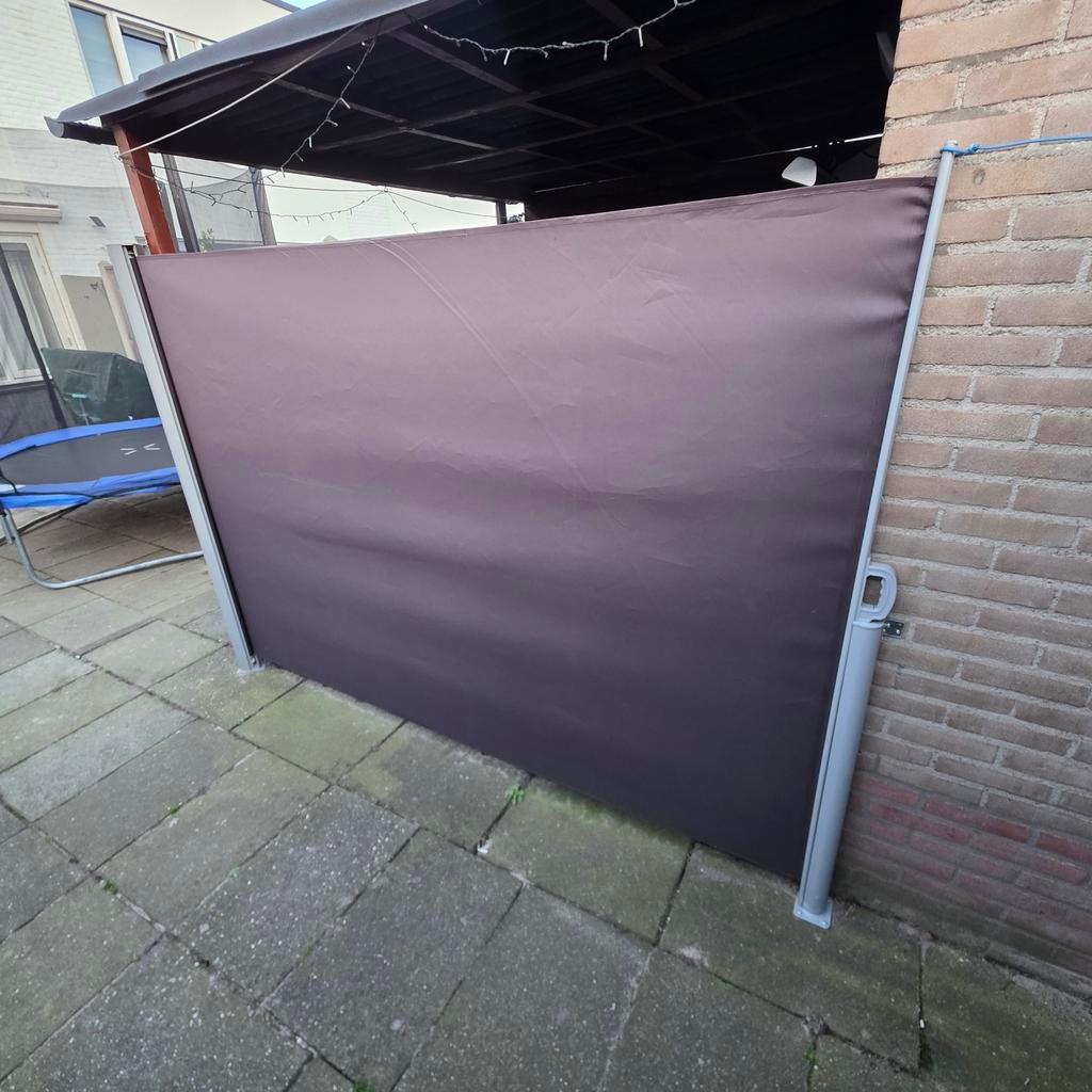 Uitschuifbaar windscherm voor terras of balkon, Ophalen of Verzenden, Gebruikt