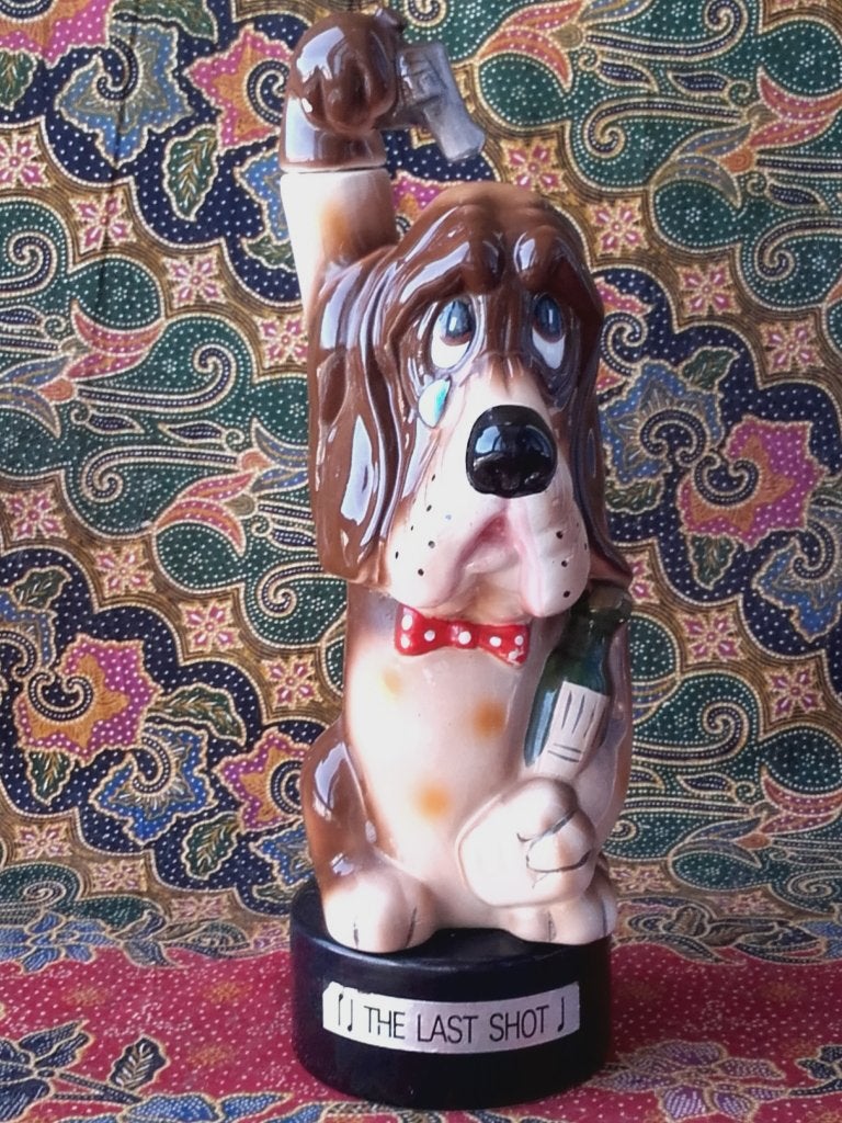 Vintage Engelse Woeful Willy decanter met muziekdoos 31 cm.