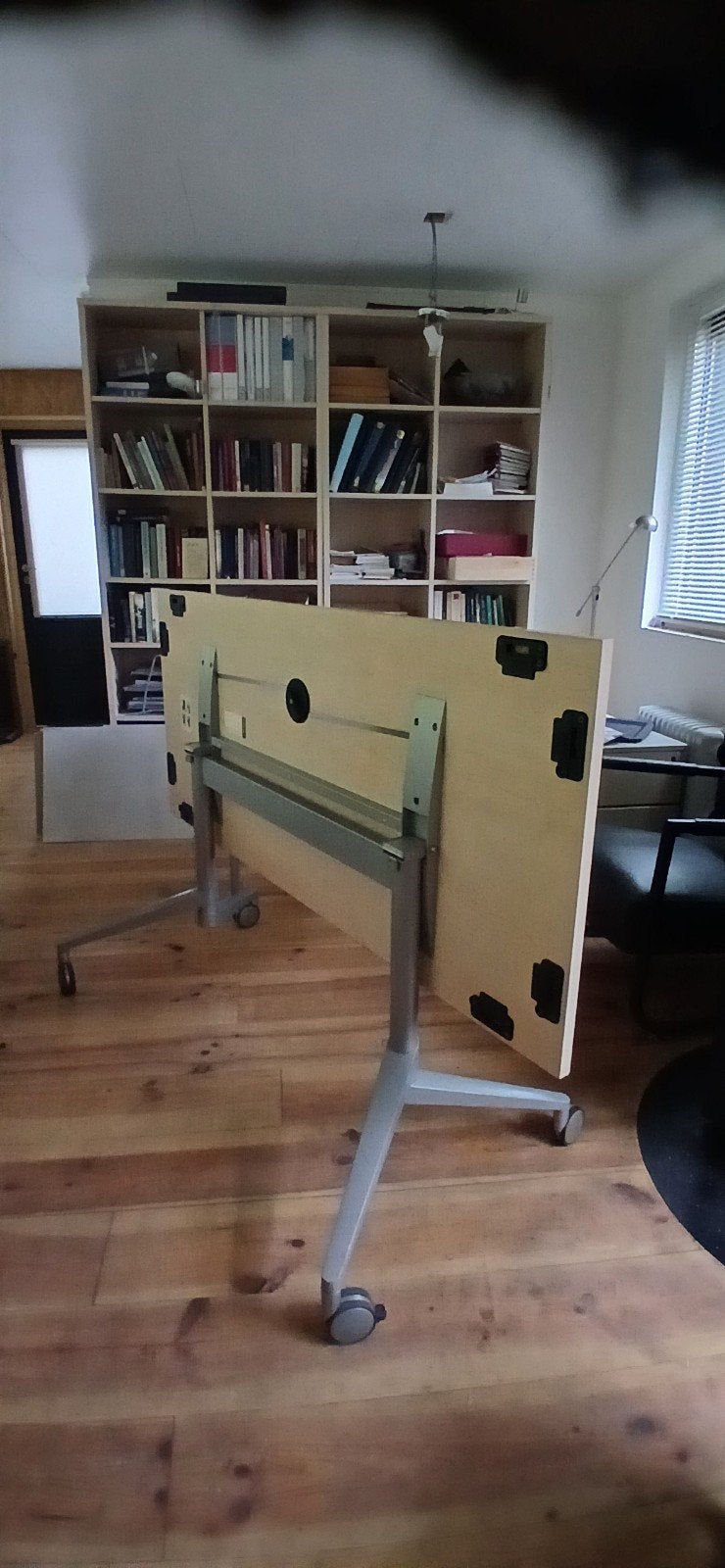 Praktische inklaptafels, Ophalen