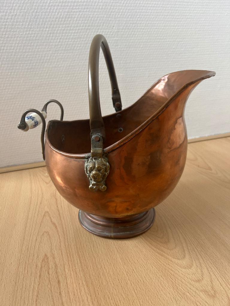 Antieke kolen emmer, Ophalen