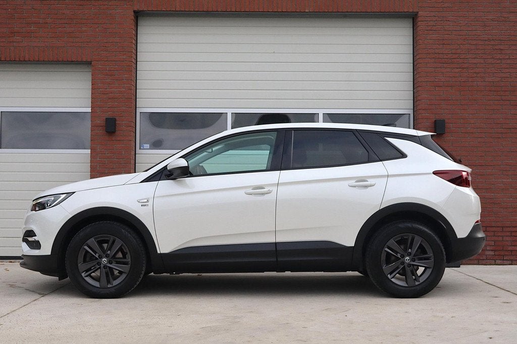 Opel Grandland X 1.2 Turbo 120 Jaar Edition - Automaat - Car, Auto's, Opel, Gebruikt, 1199 cc, Leder en Stof, Wit